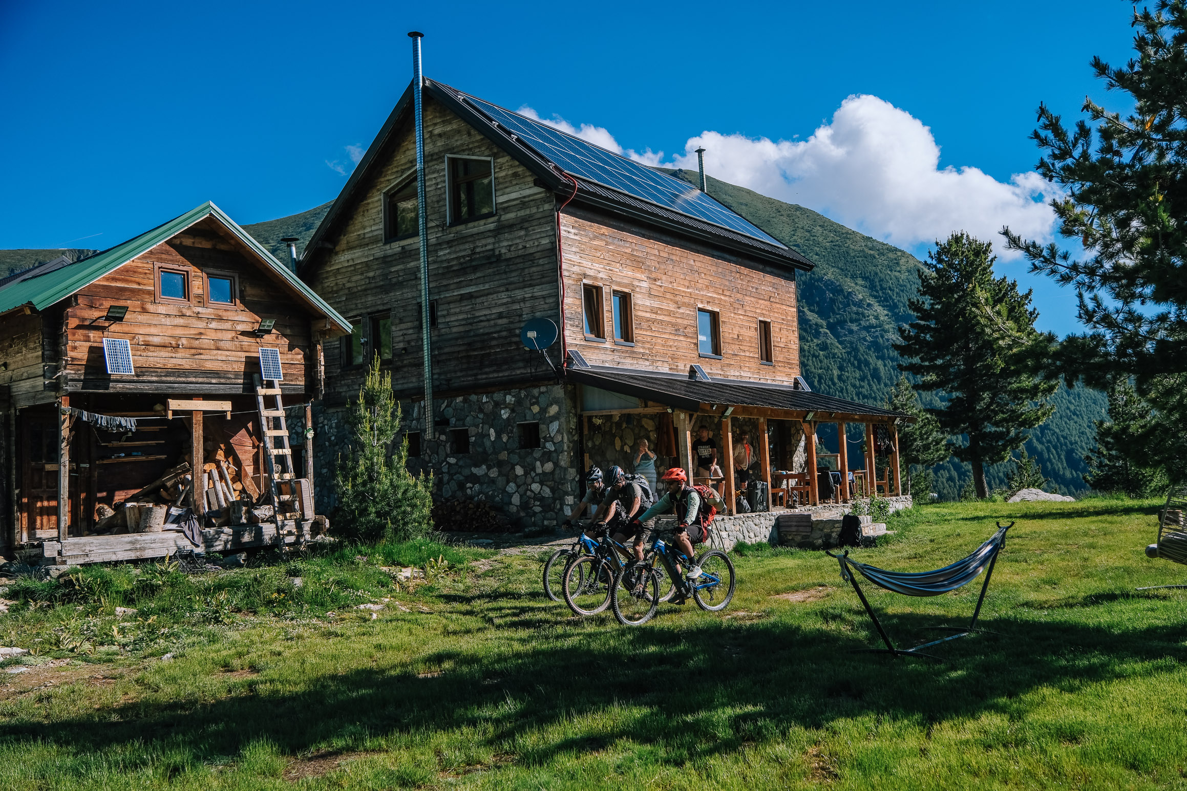 Bikes parked outside Gacaferi Guesthouse at the end of the highest stage